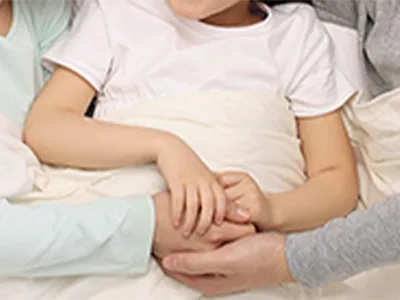 Children sleeping in the same bed